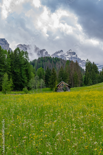 Val di Moris, Seres, spring landscape in the Dolomites with cloudy sky