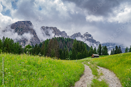 Val di Moris, Seres, spring landscape in the Dolomites with cloudy sky