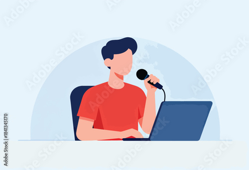 Person with laptop and microphone, speaking into it