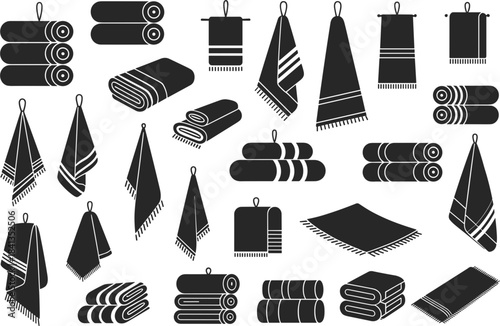 Assortment of Rolled and Folded Towels with Decorative Stripes bath towel hand towel