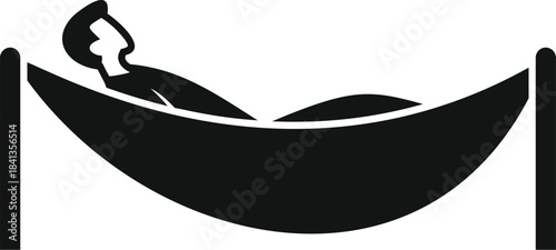 Man relaxing and lying in hammock resting outdoors enjoying peaceful moment