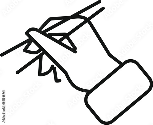 Hand holding two chopsticks picking up food, representing asian cuisine and dining concepts