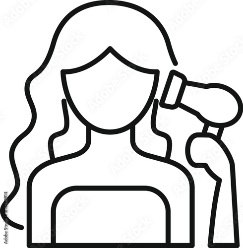 Woman drying hair with hairdryer creating stylish blow dry