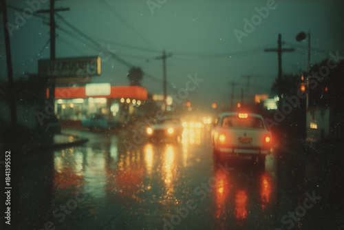 a grainy, blurry photograph of lights on the roof of an old car at sunset, in the style of tarkovsky's polaroid photography