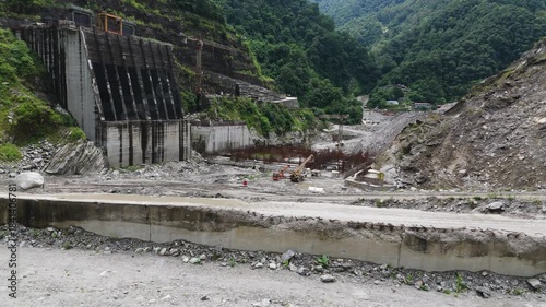 Aerial 4K Drone Footage of Arun III Hydropower Project Construction Site in Nepal - Massive Concrete Dam Infrastructure and Renewable Energy Development on Arun River