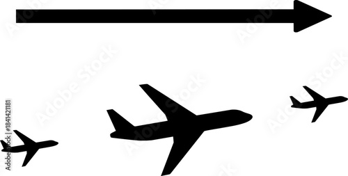 Three airplanes flying in formation under a large black arrow silhouette