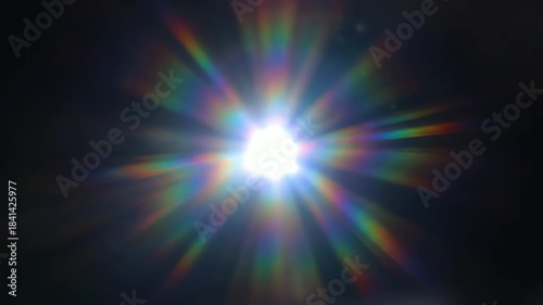 Bright Starburst Lens Flare with Rainbow Colors.