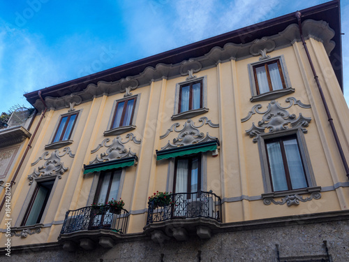Old residential building along Via Gherardini in Milan, Italy
