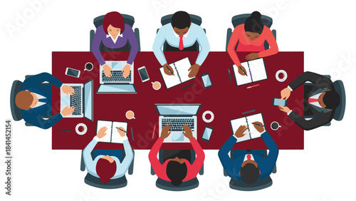 Diverse business professionals working at a conference table, top view