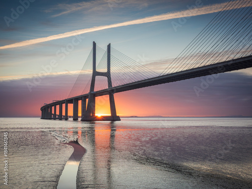 Vasco da Gama bridge over tagus river in Lisbon, Portugal, at sunrise