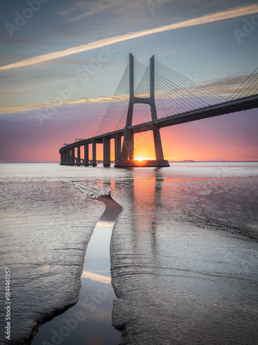 Vasco da Gama bridge over tagus river in Lisbon, Portugal, at sunrise