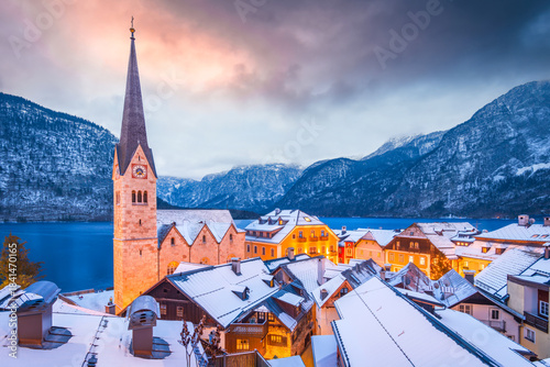 Hallstatt, Austria. Winter snow-covered village on Hallstattersee waters, Upper Austria