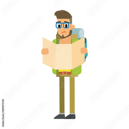 Tourist holding and reading a paper map to find direction