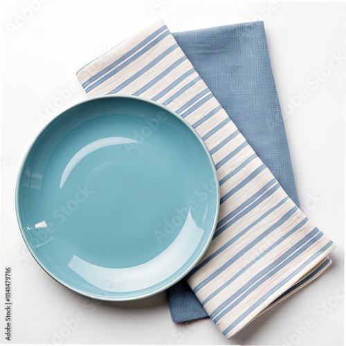 white plate on blue tablecloth