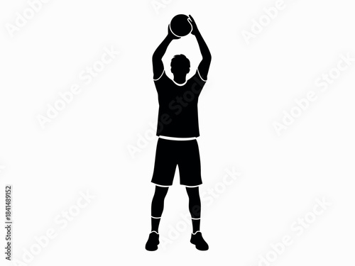 Silhouette of basketball player shooting jump shot