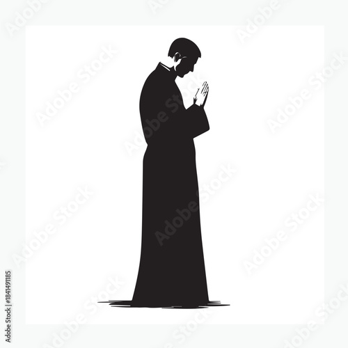 silhouette of a priest praying
