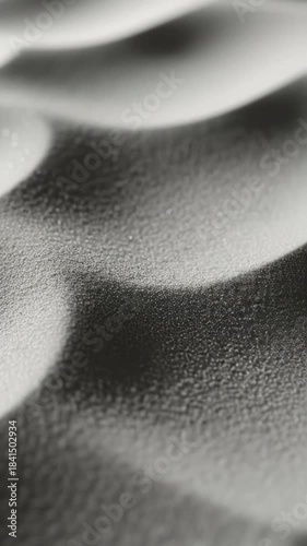 Elegant waves of shifting sand patterns creating abstract textures and shadows. Color Trend 2026. 