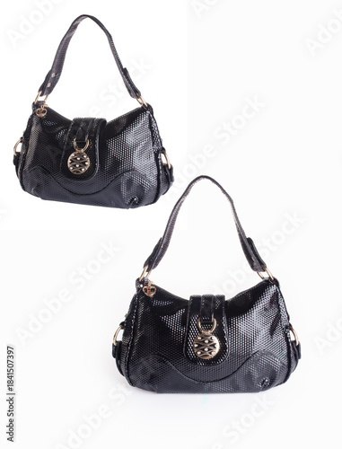 A small handbag with a textured front flap, a short shoulder strap, and a butterfly-shaped metal detail on the front.
