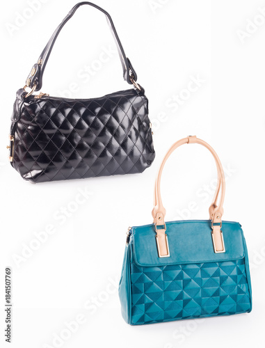 A small handbag with a textured front flap, a short shoulder strap, and a butterfly-shaped metal detail on the front.