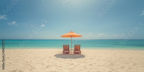 Fototapeta Naklejka Na Ścianę i Meble -  Lounge chairs with sun umbrella on a beach water, sky, beach, summer, travel, nature, sun, white, sea, blue, relaxation setting