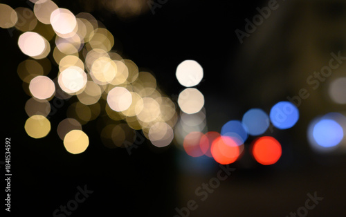 Blurry defocused lights in night time. Blurred background.