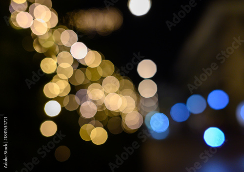 Blurry defocused lights in night time. Blurred background.