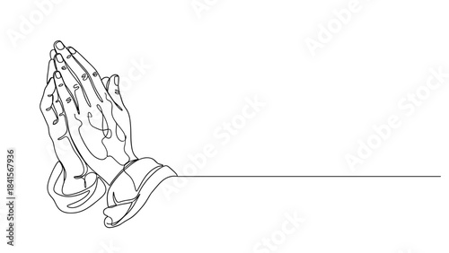 Praying hands with fingers clasped together in devotion