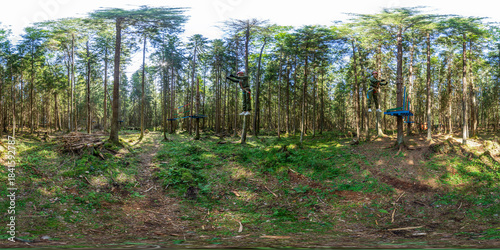 Obraz na płótnie MINSK, BELARUS - 2021: full spherical hdri panorama 360 degrees angle view in jungle park in the children's entertainment center in pinery forest in equirectangular projection