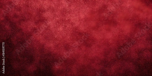 Rich crimson red abstract background with a subtle grunge texture, offering a deep and dramatic backdrop for various design projects and creative concepts