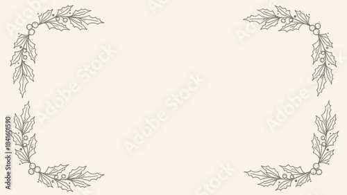 Holly leaves and berries forming a festive border on cream background for christmas decoration ideas