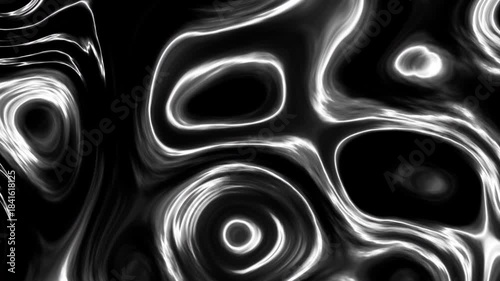 Wavy abstract surface. Close-up of a shiny smooth black liquid. Looped animation 4k.