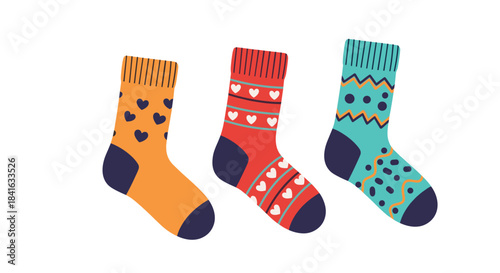 Set of three cozy and colorful knitted winter socks with various fun patterns like hearts and zig-zags on a white background.