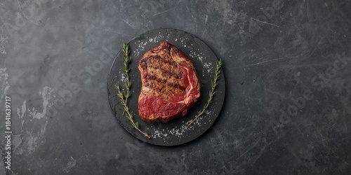 Juicy beef steak on the bon...