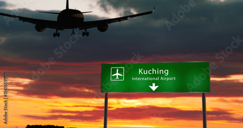 Plane landing in Kuching Malaysia airport with signboard