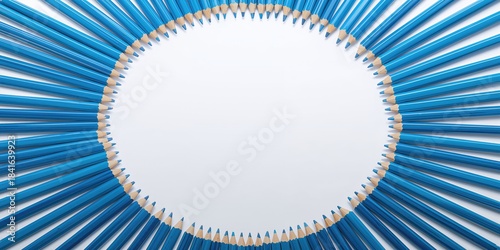 Blue pencils arranged in a ...
