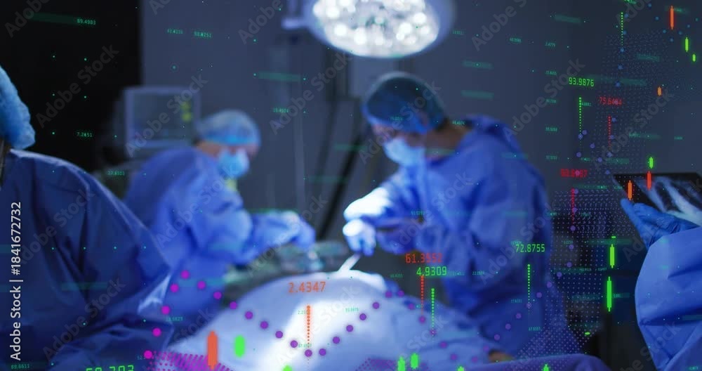Surgical team operating while tablet showing chest X-ray starting data ...