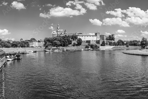 Krakow, Poland - 14 July 2023: Wawel castle and the Vistula river waterfront in black and white