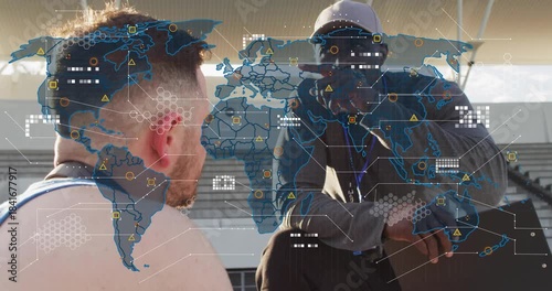 Coach speaking with clipboard, athlete in blue singlet listening, map overlay growing for training