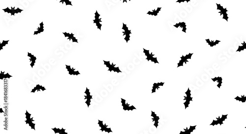 Whimsical bat silhouettes dance across a pristine white backdrop creating an eerie yet playful