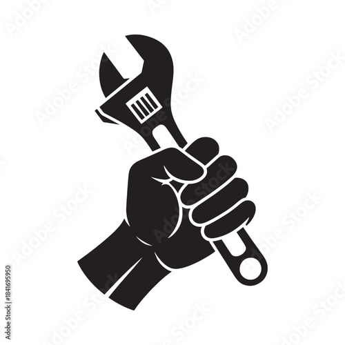 A strong hand firmly gripping a classic adjustable wrench a symbol of repair