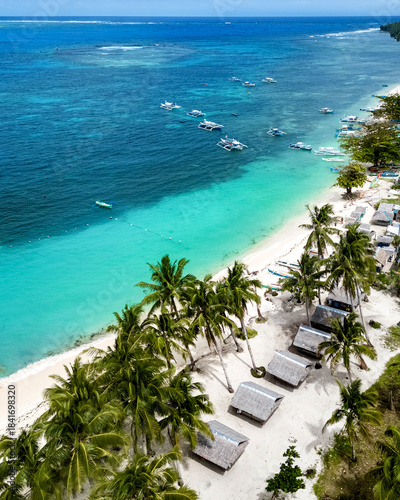 Daku Island, Siargao, Philippines. Tropical beach with palm trees