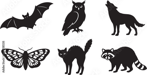 Black silhouette collection of nocturnal and forest animals including bat owl wolf cat raccoon and butterfly