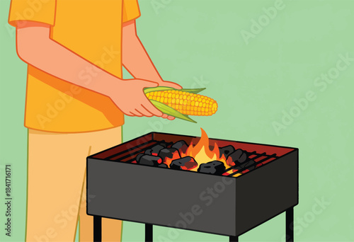 Person placing corn on a hot grill