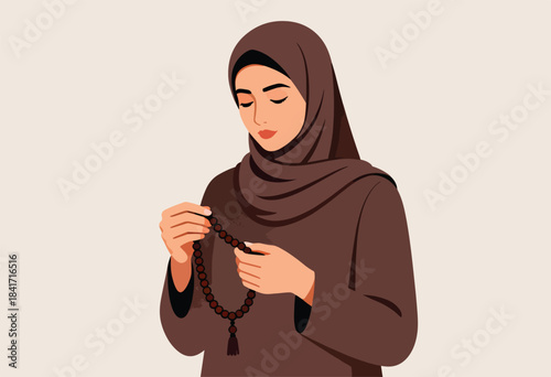 Woman wearing hijab, eyes closed, holding prayer beads