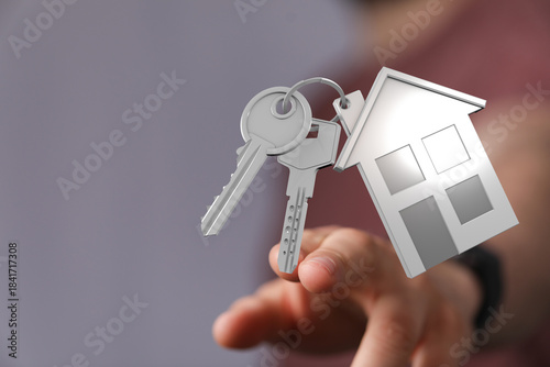 Hand presenting keys with a...
