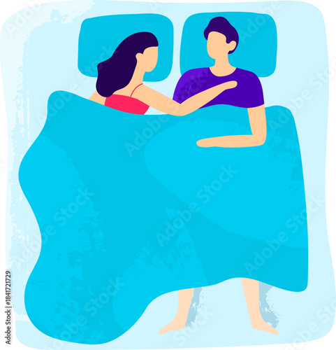 Couple lying in bed cuddling sleeping together