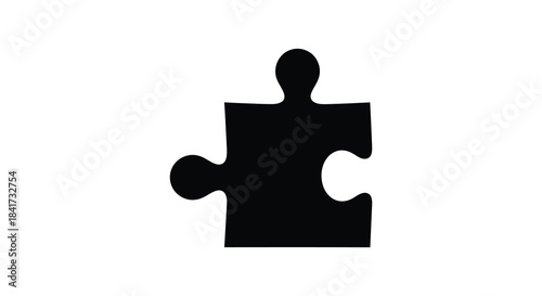 A stark black puzzle piece against a white background a simple yet striking silhouette