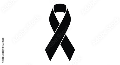 A stark black ribbon elegantly twisted and forming a symbolic loop a powerful silhouette