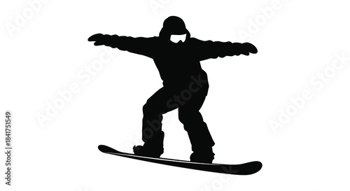 A dynamic snowboarder in mid air arms outstretched captured as a striking black silhouette