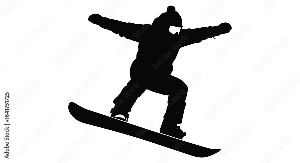 Fototapeta premium A dynamic image of a snowboarder in mid air arms outstretched captured as a bold silhouette